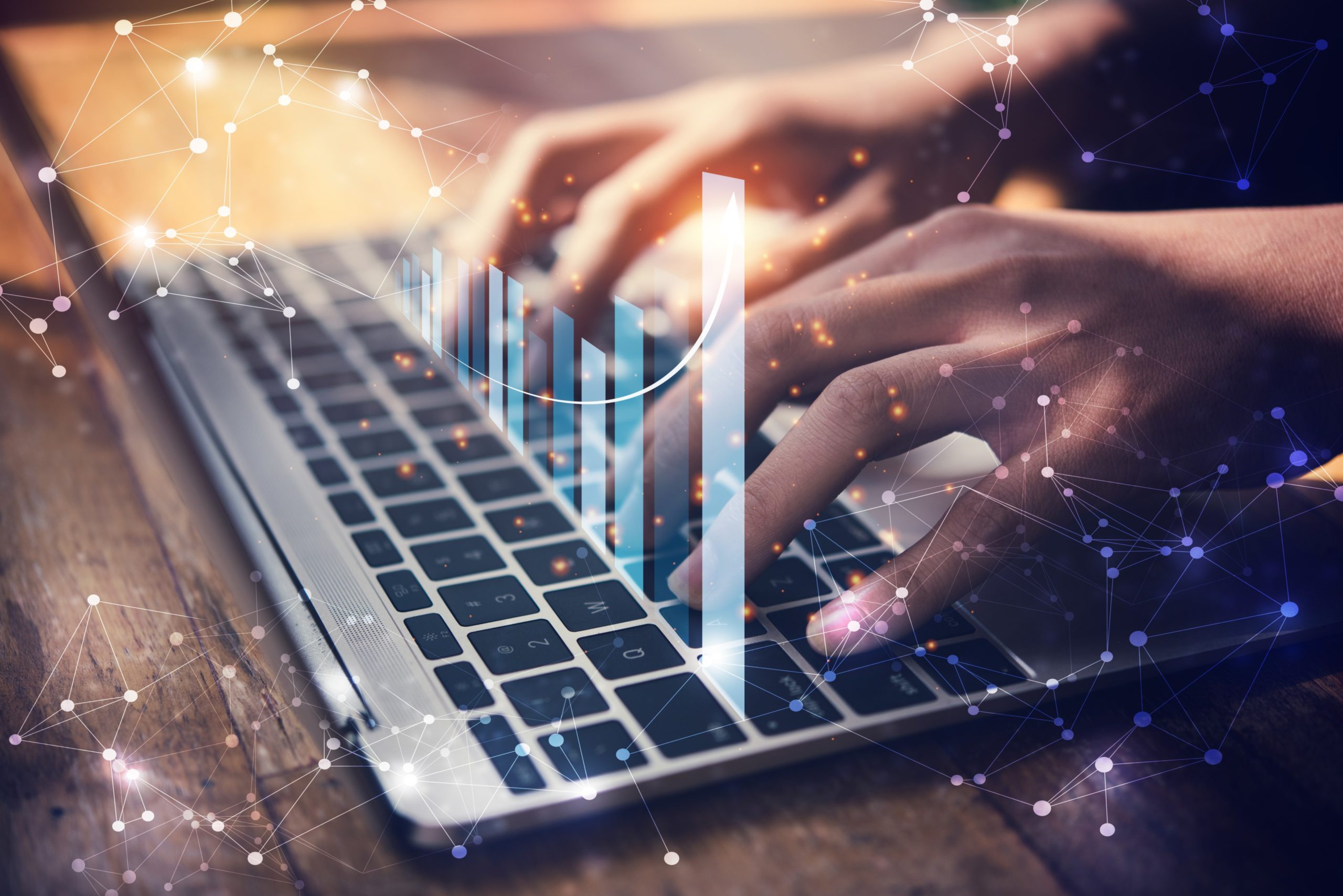 Person typing on laptop extracting data