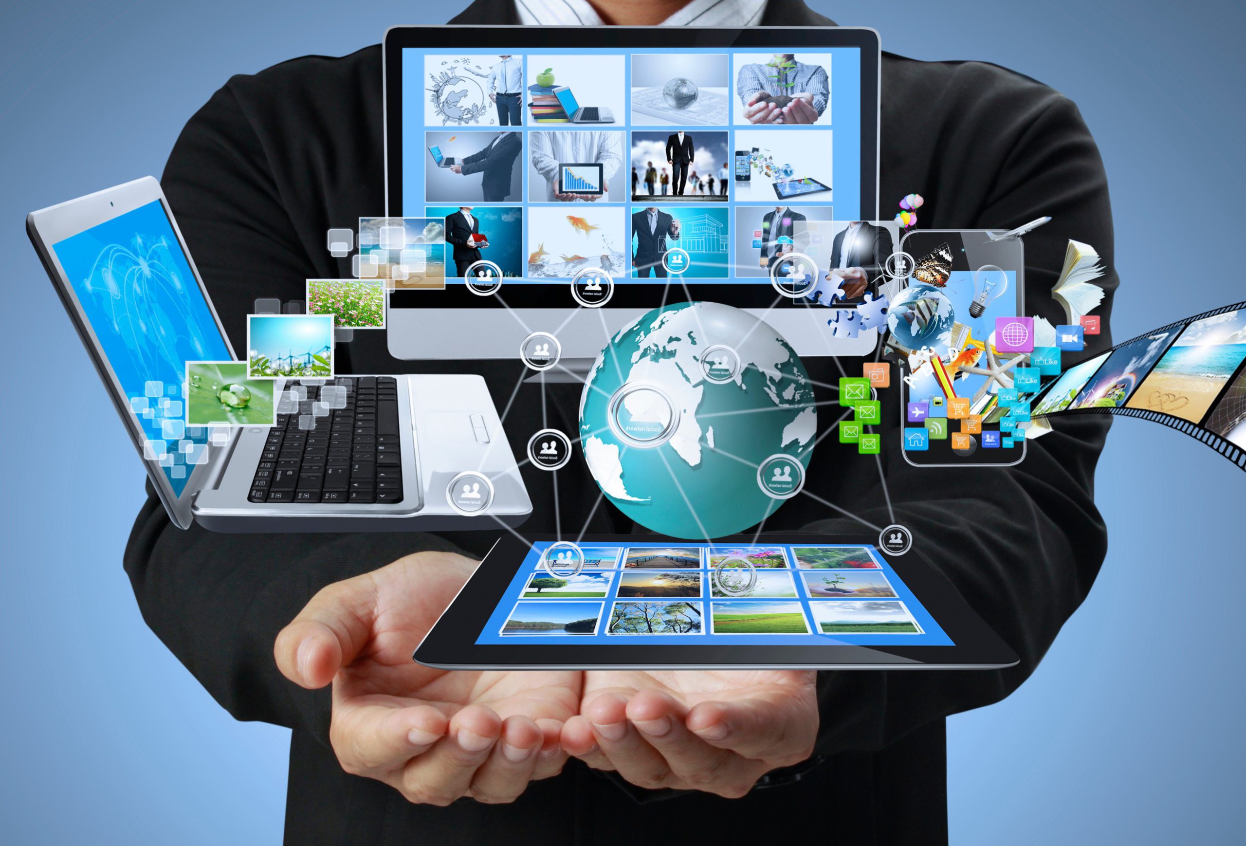 Man holding laptop with the world