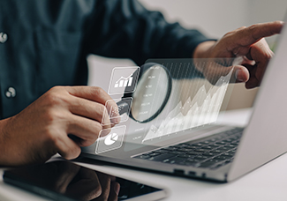 The analyses of large amounts of data and the idea of business i The analyses of large amounts of data and the idea of business intelligence. Charts of the company finances are displayed on a screen that is simulated.