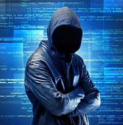 Faceless hacker on code background Faceless hacker on code background