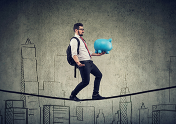 man with backpack and piggy bank walking balancing on a rope above a city skyline Business man with backpack and piggy bank walking balancing on a rope above a city skyline
