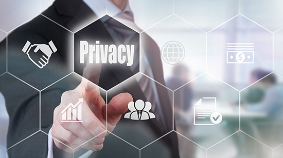 Privacy Concept A businessman selecting a Privacy Concept button on a clear screen.